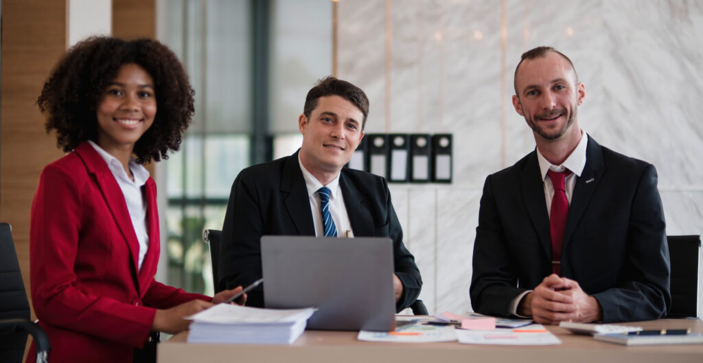 Three professionals highlight teamwork and growth in sales representative jobs.
